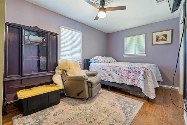 20490 Rocky Branch Rd, Rogers, AR 72756 - bedroom featuring light wood-type flooring and a ceiling fan