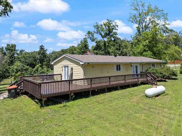20490 Rocky Branch Rd, Rogers, AR 72756 - rear view of house featuring a wooden deck, a yard, and a chimney