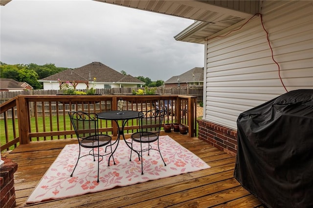 4506 Cory St, Springdale, AR 72762 - deck featuring a fenced backyard and grilling area
