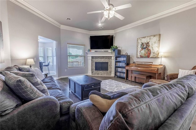 4506 Cory St, Springdale, AR 72762 - living area with ornamental molding, wood finished floors, ceiling fan, and a fireplace