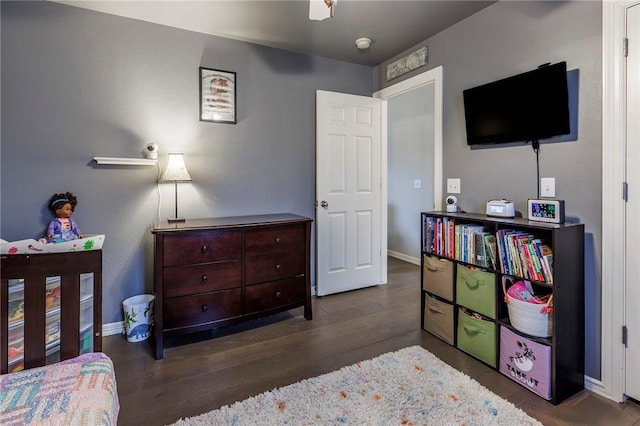 4506 Cory St, Springdale, AR 72762 - bedroom with baseboards and wood finished floors