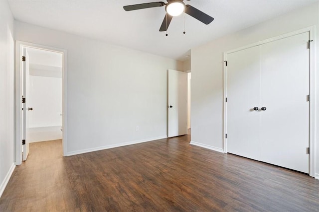 1766 Green Acres Cir, Springdale, AR 72764 - unfurnished bedroom featuring wood finished floors, a closet, and a ceiling fan
