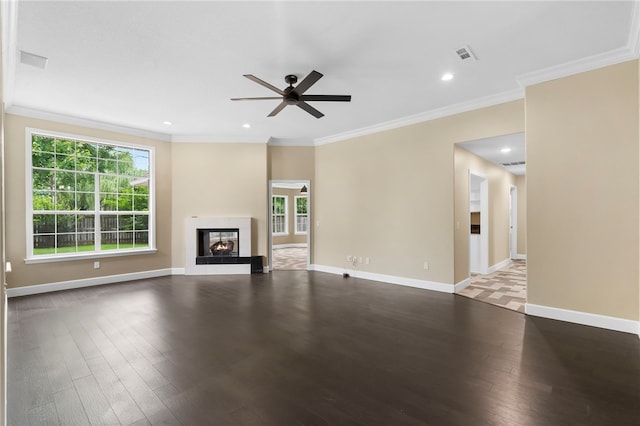 4465 Warwick Cv, Springdale, AR 72762 - unfurnished living room featuring a ceiling fan, wood finished floors, crown molding, recessed lighting, and a multi sided fireplace