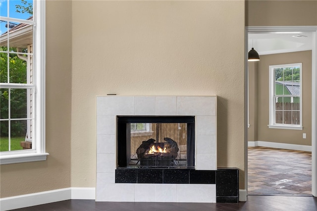 4465 Warwick Cv, Springdale, AR 72762 - detailed view of a tiled fireplace and wood finished floors