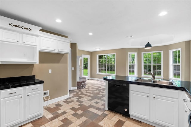 4465 Warwick Cv, Springdale, AR 72762 - kitchen featuring dishwasher, white cabinets, recessed lighting, hanging light fixtures, and tile counters