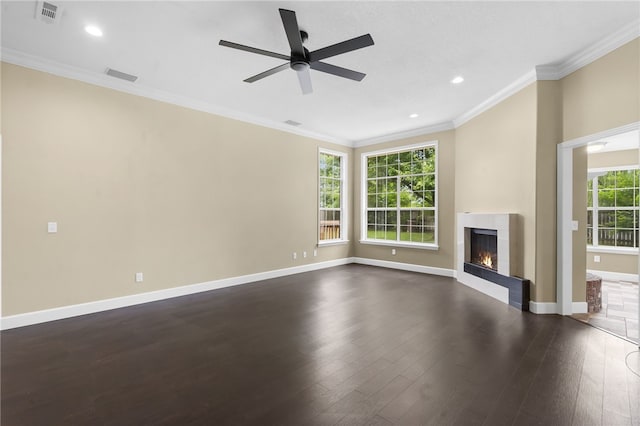 4465 Warwick Cv, Springdale, AR 72762 - unfurnished living room featuring ceiling fan, dark wood-style floors, a glass covered fireplace, ornamental molding, and recessed lighting