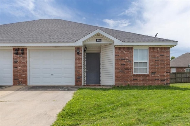 256/258 Graystone Cir, Centerton, AR 72719 - ranch-style house with concrete driveway, brick siding, an attached garage, and a shingled roof