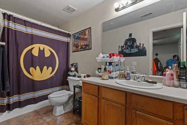 256/258 Graystone Cir, Centerton, AR 72719 - bathroom with vanity and tile patterned floors