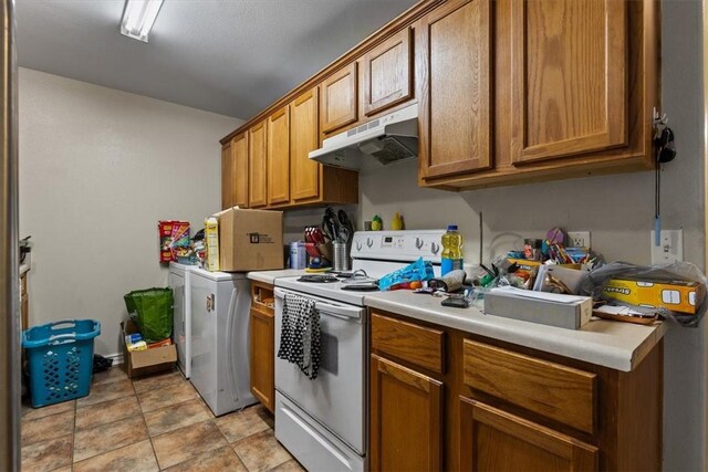 256/258 Graystone Cir, Centerton, AR 72719 - kitchen featuring under cabinet range hood, white range with electric stovetop, brown cabinets, light countertops, and washer and dryer