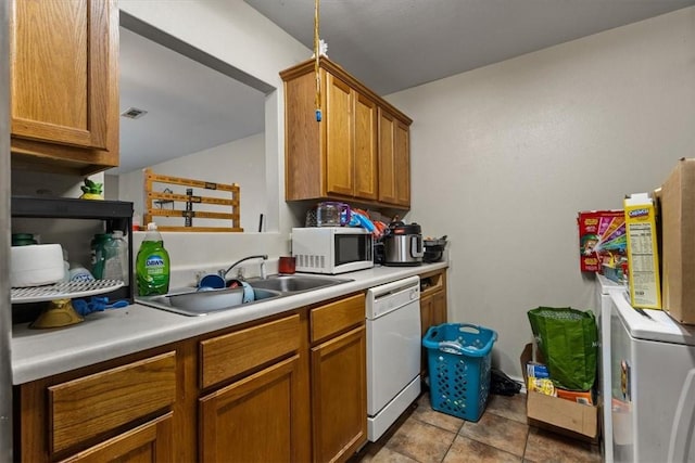 256/258 Graystone Cir, Centerton, AR 72719 - kitchen with white appliances, brown cabinetry, and light countertops