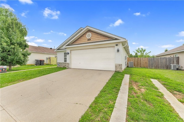 389 Cascade Cir, Springdale, AR 72764 - view of front of property featuring stone siding and a garage