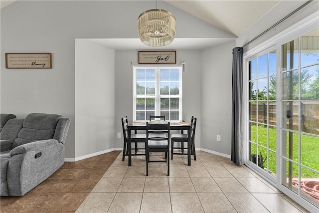 389 Cascade Cir, Springdale, AR 72764 - dining area with healthy amount of natural light, vaulted ceiling, and light tile patterned flooring