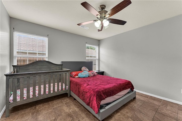 389 Cascade Cir, Springdale, AR 72764 - bedroom with baseboards and ceiling fan