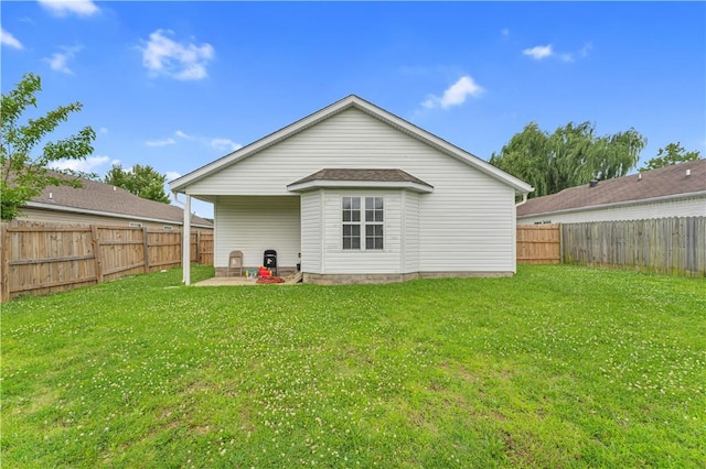 389 Cascade Cir, Springdale, AR 72764 - rear view of house featuring a patio area and a fenced backyard