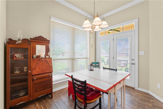 203 Crawford St, Pea Ridge, AR 72751 - dining room with a chandelier, crown molding, and dark wood-type flooring