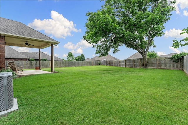 203 Crawford St, Pea Ridge, AR 72751 - fenced backyard with ceiling fan and a patio
