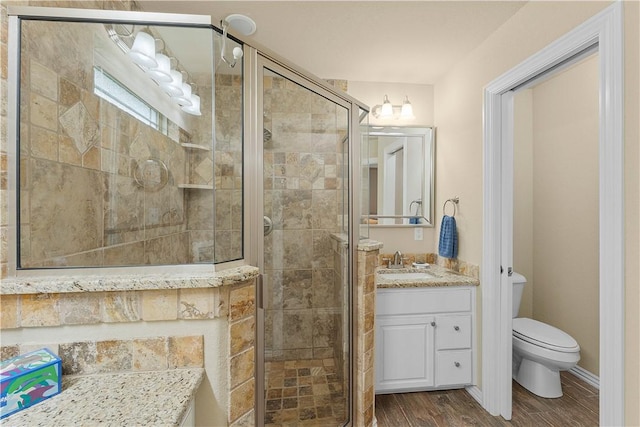 203 Crawford St, Pea Ridge, AR 72751 - full bath featuring vanity, a shower stall, and wood finished floors