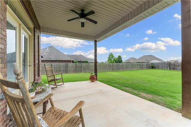 203 Crawford St, Pea Ridge, AR 72751 - fenced backyard featuring a patio and a ceiling fan