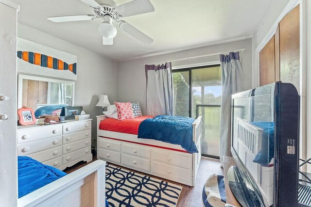 16841 Heritage Bay Rd Unit E-4, Rogers, AR 72756 - bedroom with ceiling fan