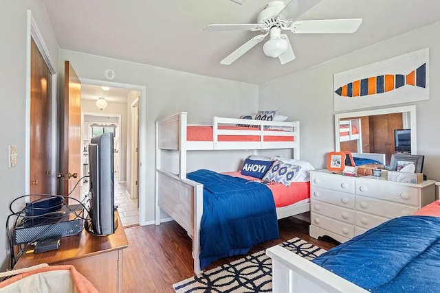 16841 Heritage Bay Rd Unit E-4, Rogers, AR 72756 - bedroom featuring wood finished floors and a ceiling fan