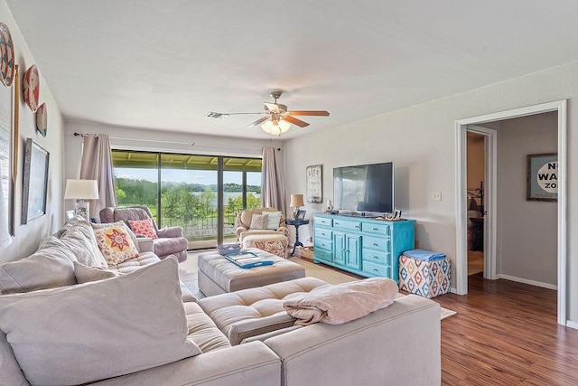 16841 Heritage Bay Rd Unit E-4, Rogers, AR 72756 - living room with ceiling fan and light wood-type flooring