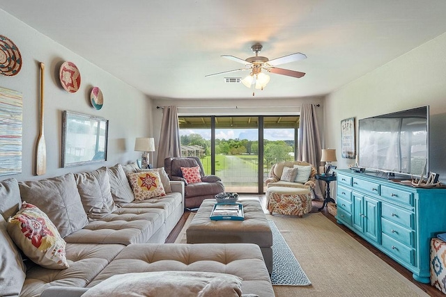 16841 Heritage Bay Rd Unit E-4, Rogers, AR 72756 - living area featuring a ceiling fan and light wood-type flooring