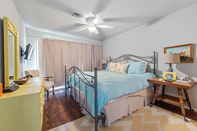 16841 Heritage Bay Rd Unit E-4, Rogers, AR 72756 - bedroom featuring wood finished floors and ceiling fan