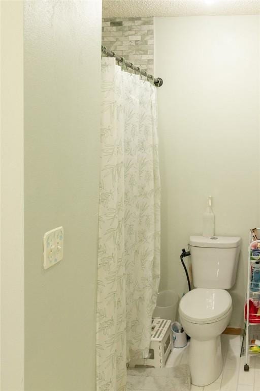 1013 N 26th St, Rogers, AR 72756 - full bath featuring curtained shower and tile patterned floors