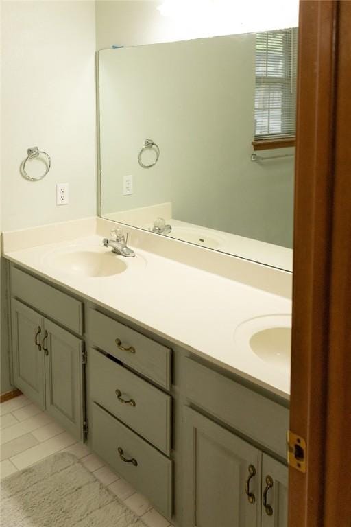 1013 N 26th St, Rogers, AR 72756 - bathroom featuring double vanity and tile patterned floors