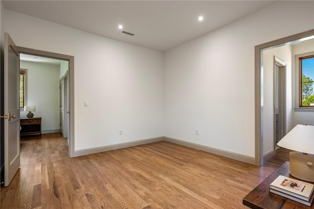 300 NW 5th St, Bentonville, AR 72712 - spare room with light wood finished floors and recessed lighting