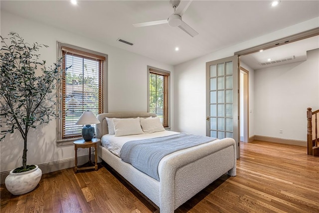 300 NW 5th St, Bentonville, AR 72712 - bedroom featuring recessed lighting, wood finished floors, and a ceiling fan