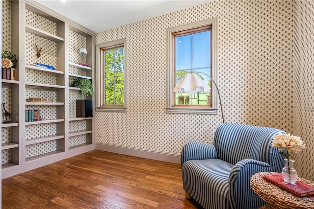 300 NW 5th St, Bentonville, AR 72712 - living area with wallpapered walls and wood finished floors