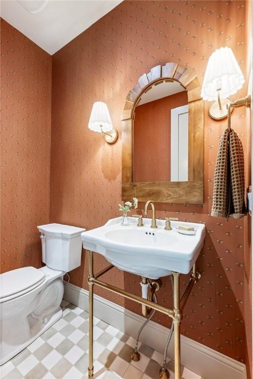 300 NW 5th St, Bentonville, AR 72712 - half bath featuring tile patterned floors and wallpapered walls