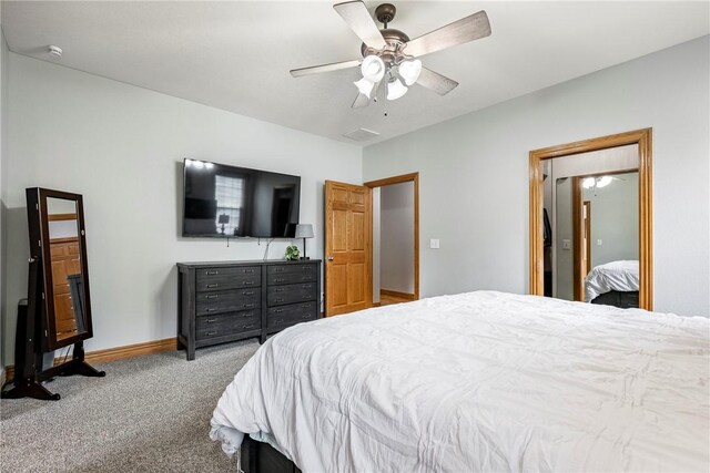 2 Conner Ln, Rogers, AR 72756 - carpeted bedroom with baseboards and a ceiling fan