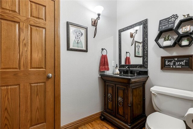 2 Conner Ln, Rogers, AR 72756 - bathroom featuring vanity and wood finished floors
