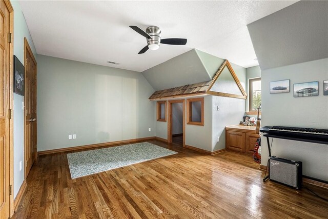 2 Conner Ln, Rogers, AR 72756 - bonus room featuring light wood finished floors, ceiling fan, and vaulted ceiling