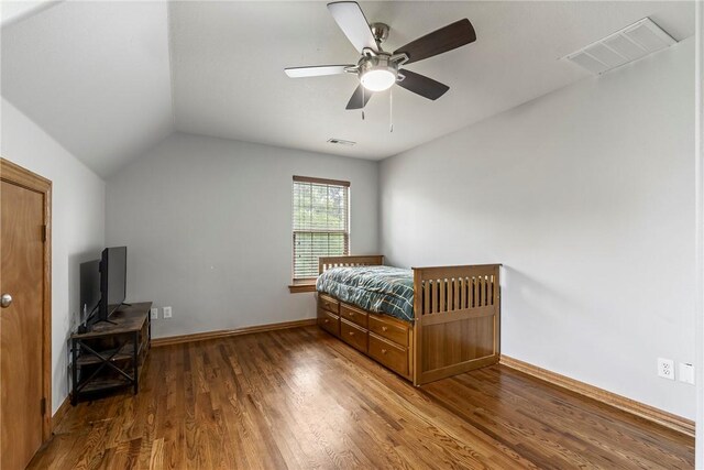 2 Conner Ln, Rogers, AR 72756 - bedroom featuring wood finished floors, lofted ceiling, and ceiling fan