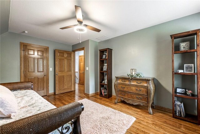 2 Conner Ln, Rogers, AR 72756 - bedroom with wood finished floors and a ceiling fan