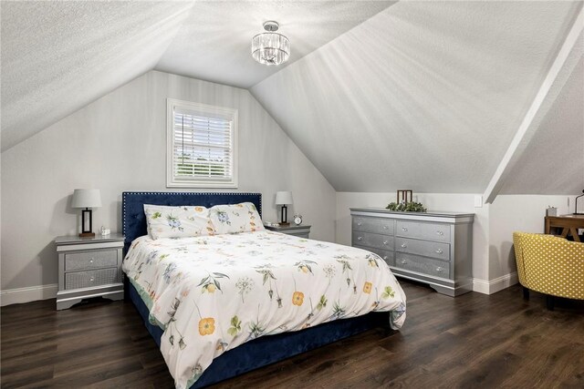 2 Conner Ln, Rogers, AR 72756 - bedroom featuring wood finished floors, lofted ceiling, and a textured ceiling