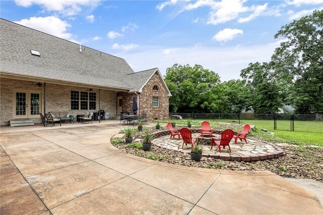 2 Conner Ln, Rogers, AR 72756 - view of patio / terrace featuring french doors and a fire pit