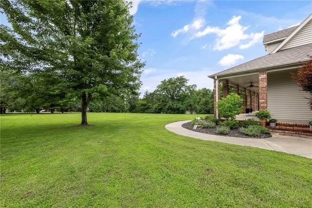 2 Conner Ln, Rogers, AR 72756 - view of green lawn featuring ceiling fan