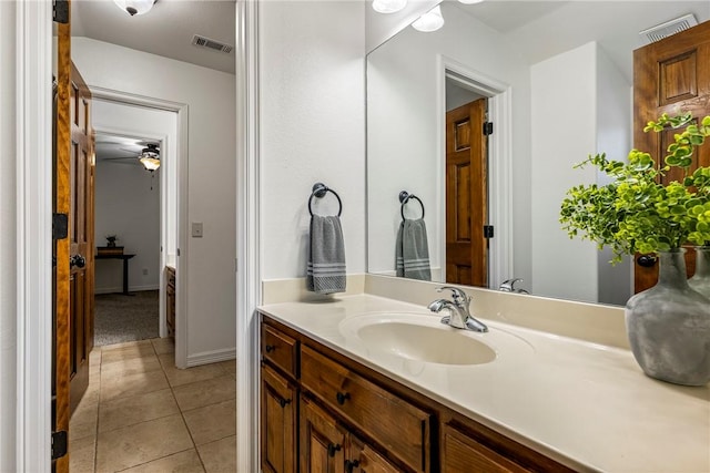 5100 SW Blaire Mont Rd, Bentonville, AR 72713 - bathroom featuring vanity and tile patterned floors