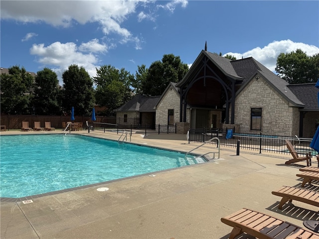 5100 SW Blaire Mont Rd, Bentonville, AR 72713 - community pool featuring a patio