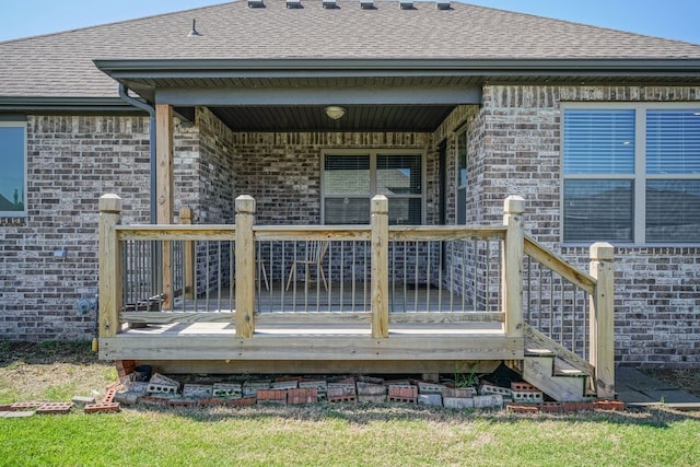 3500 SW Picasso Blvd, Bentonville, AR 72712 - back of house featuring brick siding, a shingled roof, and a deck