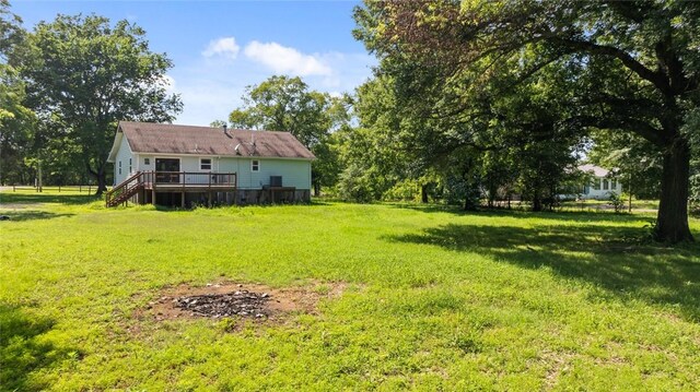 234 N Kibler Hwy, Alma, AR 72921 - view of grassy yard with a deck
