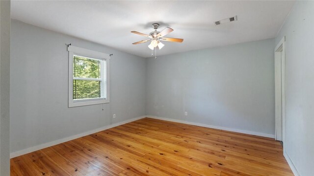 234 N Kibler Hwy, Alma, AR 72921 - unfurnished room featuring light wood-type flooring and ceiling fan