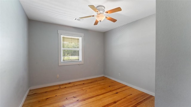 234 N Kibler Hwy, Alma, AR 72921 - unfurnished room with wood finished floors and ceiling fan
