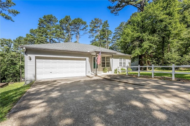 16101 Hickory Dr, Rogers, AR 72756 - view of front of house with asphalt driveway and an attached garage