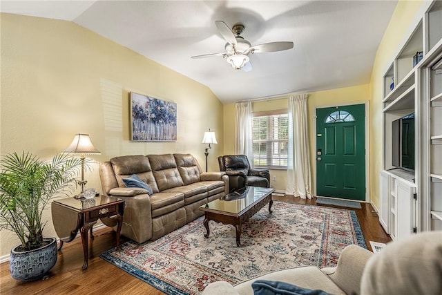 16101 Hickory Dr, Rogers, AR 72756 - living room featuring vaulted ceiling, wood finished floors, and ceiling fan
