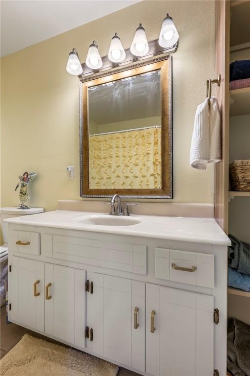 16101 Hickory Dr, Rogers, AR 72756 - bathroom featuring vanity and toilet